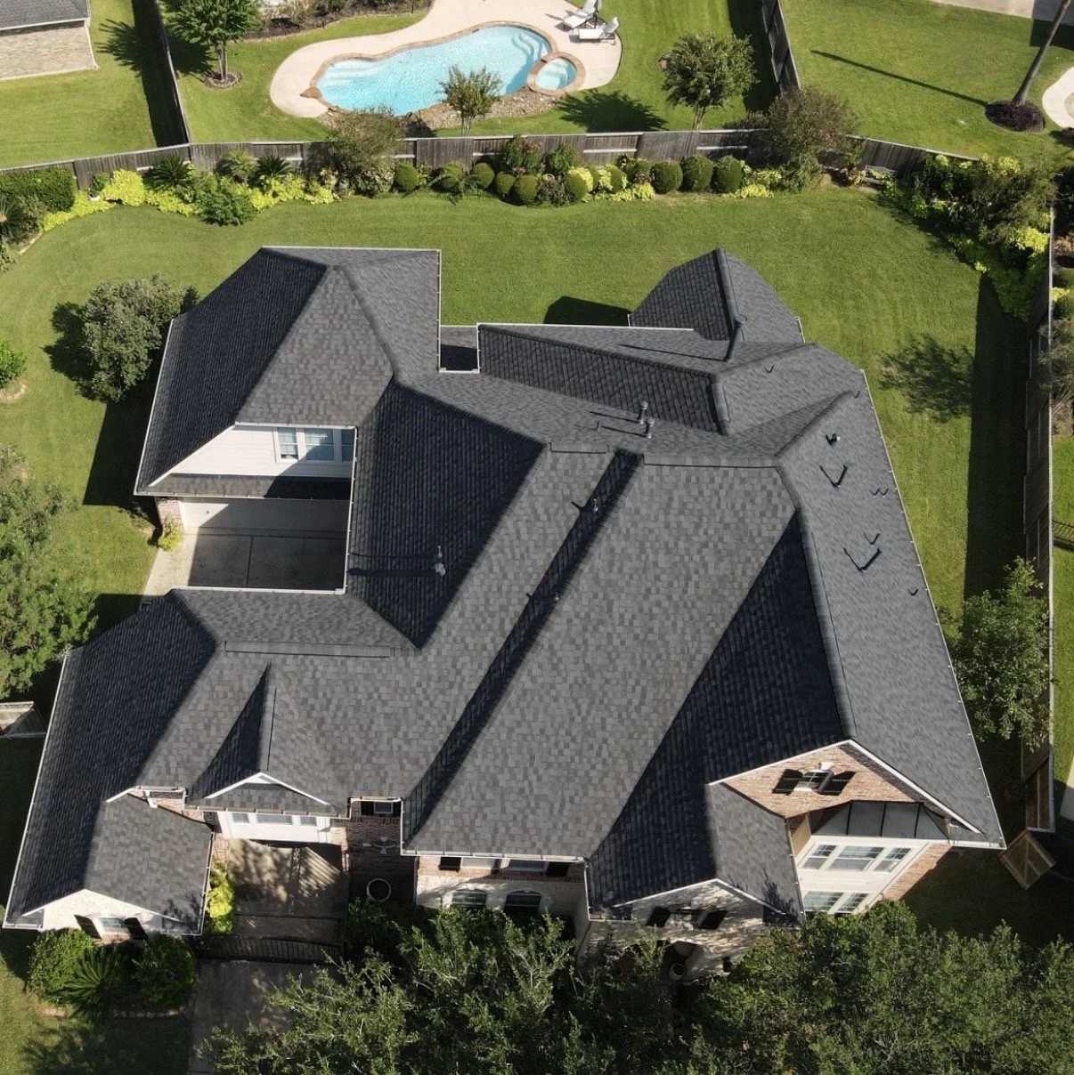 Katy home after one-day roof replacement with Owens Corning Duration shingles in Onyx Black