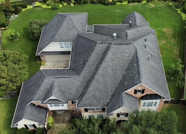 Before roof replacement on a Katy-area home following May 9, 2026 hail damage