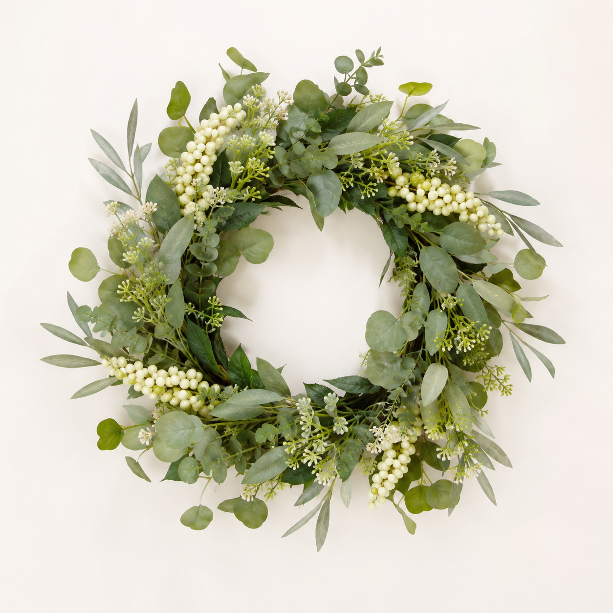 Artificial eucalyptus berry wreath with faux greenery and seeded branches