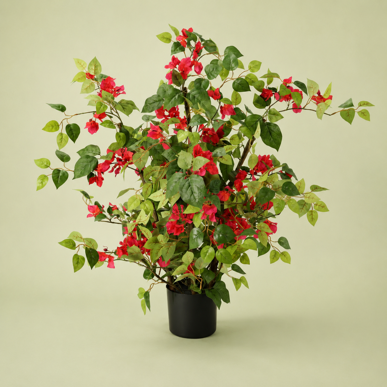 Artificial red bougainvillea potted plant with faux green foliage