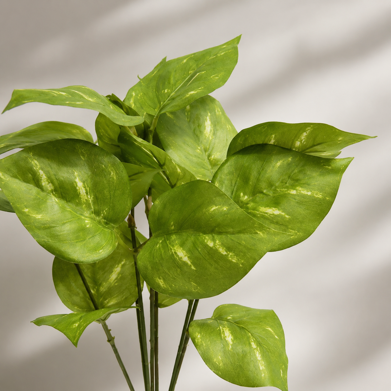 Artificial pothos bush with realistic green leaves for indoor décor
