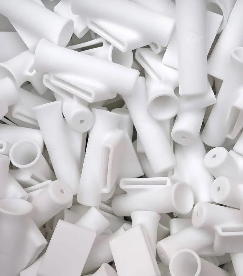 A large, green industrial machine labeled 'VICORY90' in a clean, well-lit room.