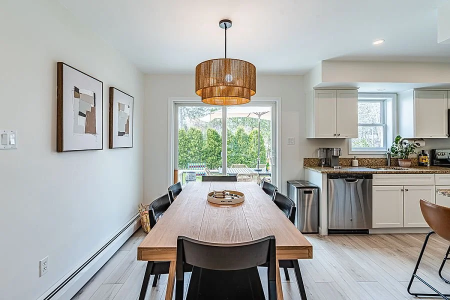 Dining Area Leading to Deck with Outdoor Dining Area