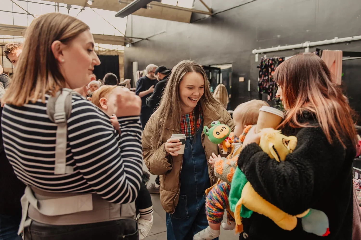 Mums chatting over a coffee at The Swap Day