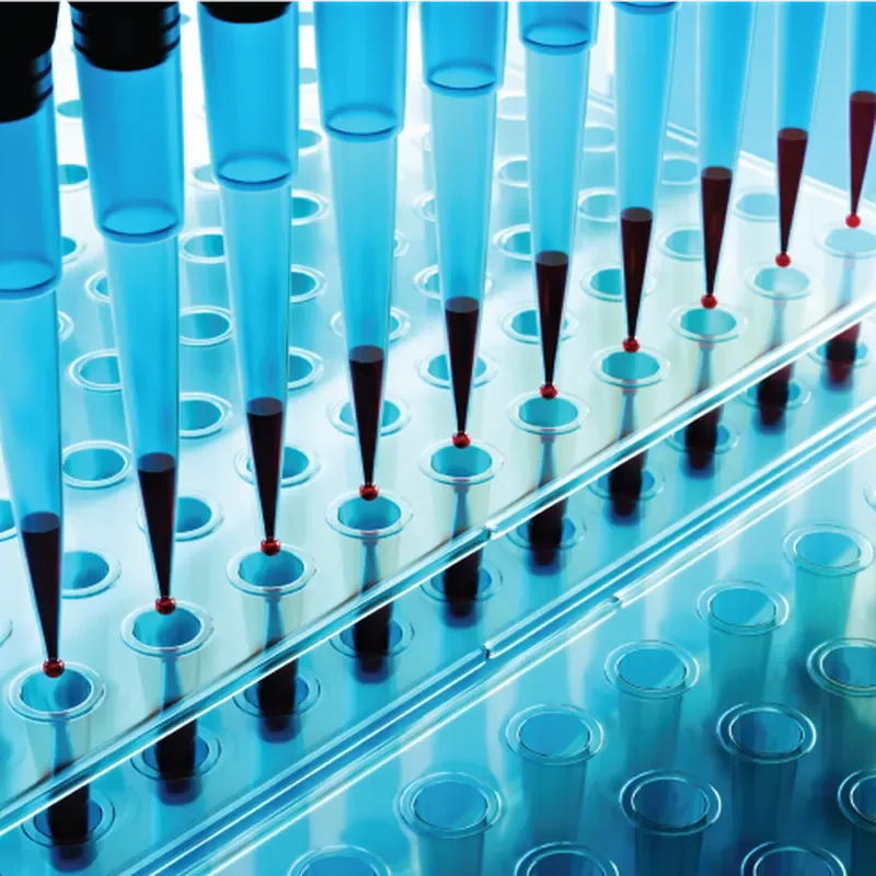 Automated liquid handling system dispensing samples into a laboratory microplate for high-throughput screening