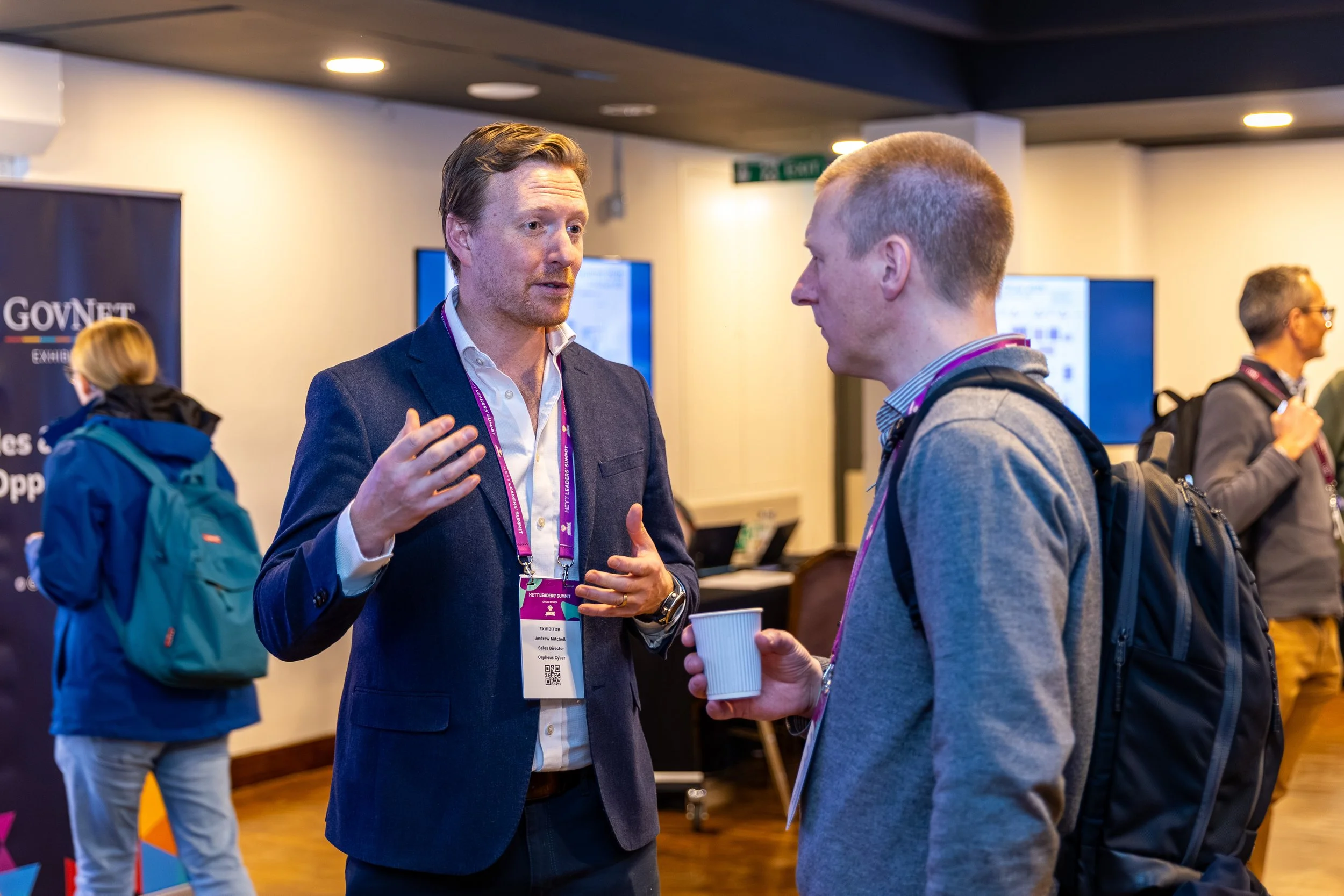 Delegates having a face-to-face conversation at HETT Leaders' Summit