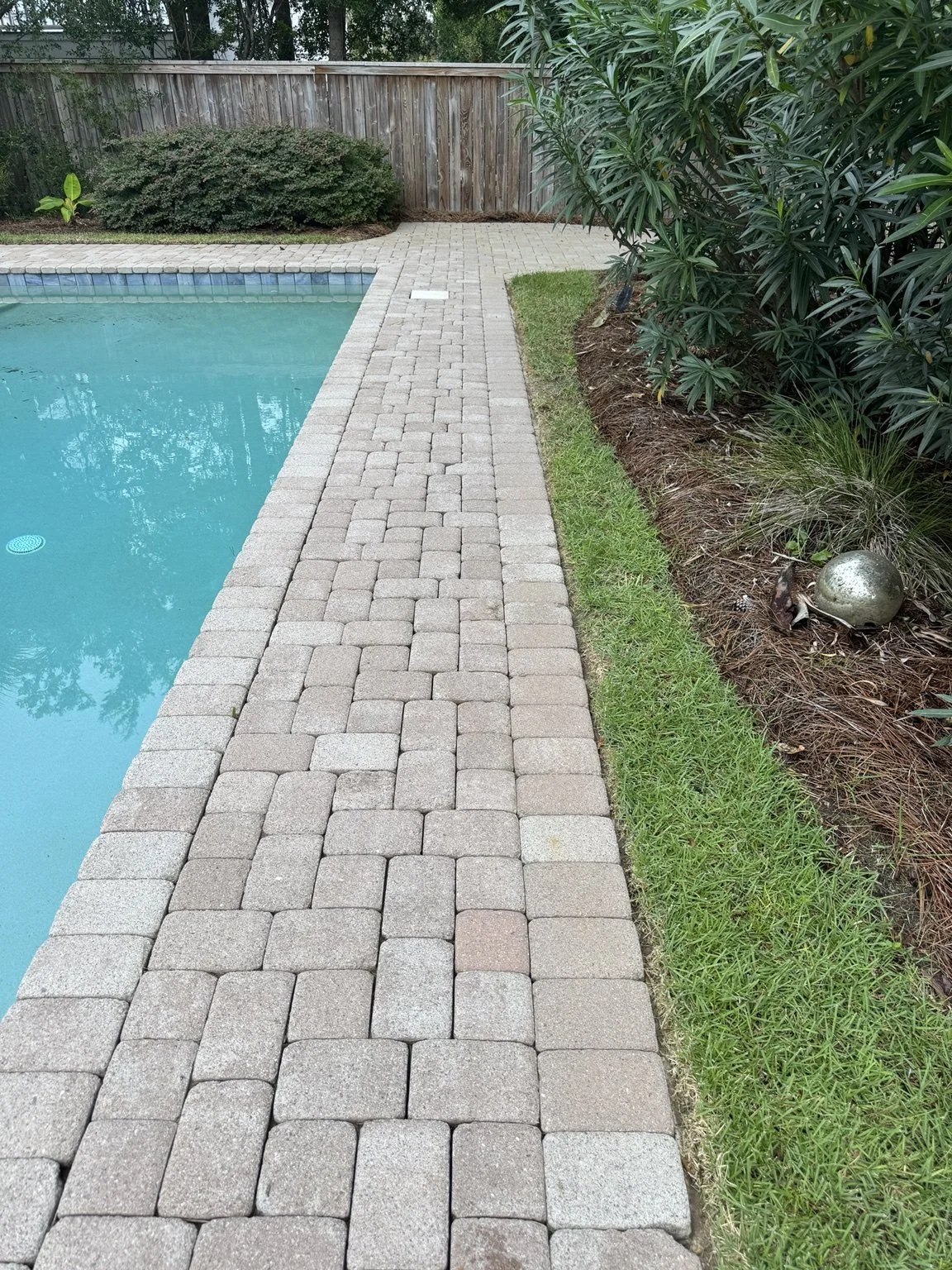 After: Pool deck paver cleaning by PaveClean on Isle of Palms, SC.