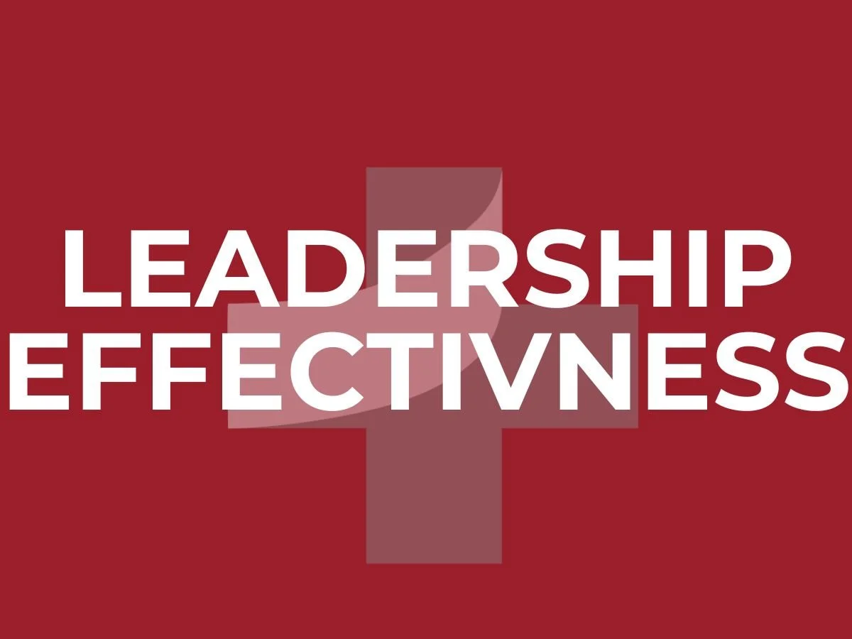 Graphic featuring the words ‘Leadership Effectiveness’ in bold white text centered on a deep maroon background with a translucent plus-sign motif, symbolizing alignment and impactful leadership.