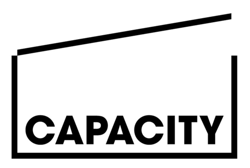 Sign with the word "CAPACITY" and an empty space indicating capacity limit.