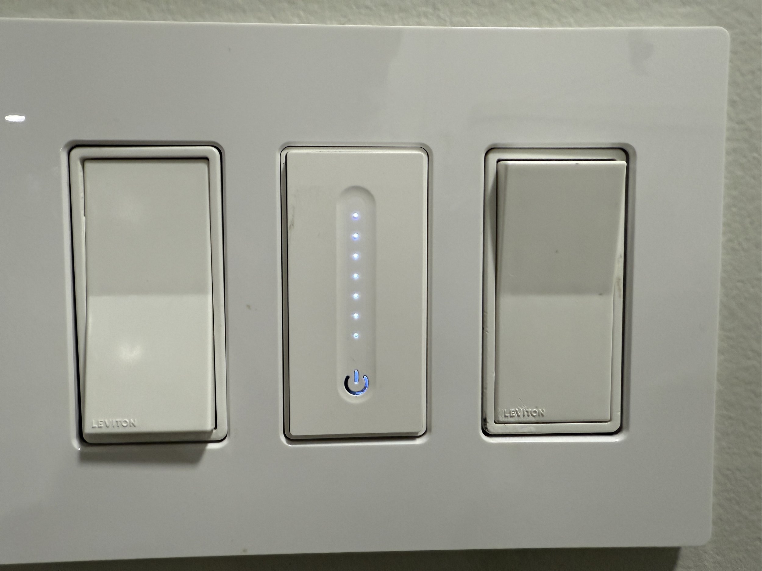 Smart light switch installed with integrated dimmer and WiFi control. Setup included pairing with home assistant for app and voice command use. Brigham City, UT.