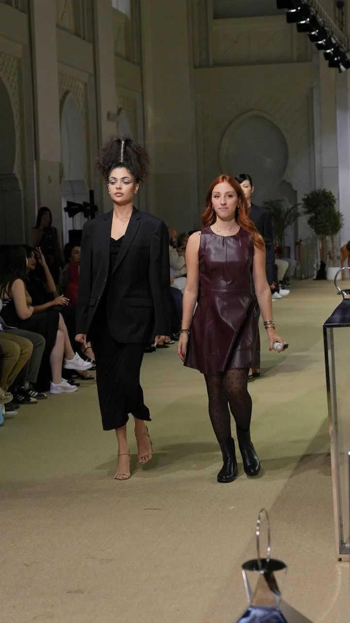 indira walking with models catwalk