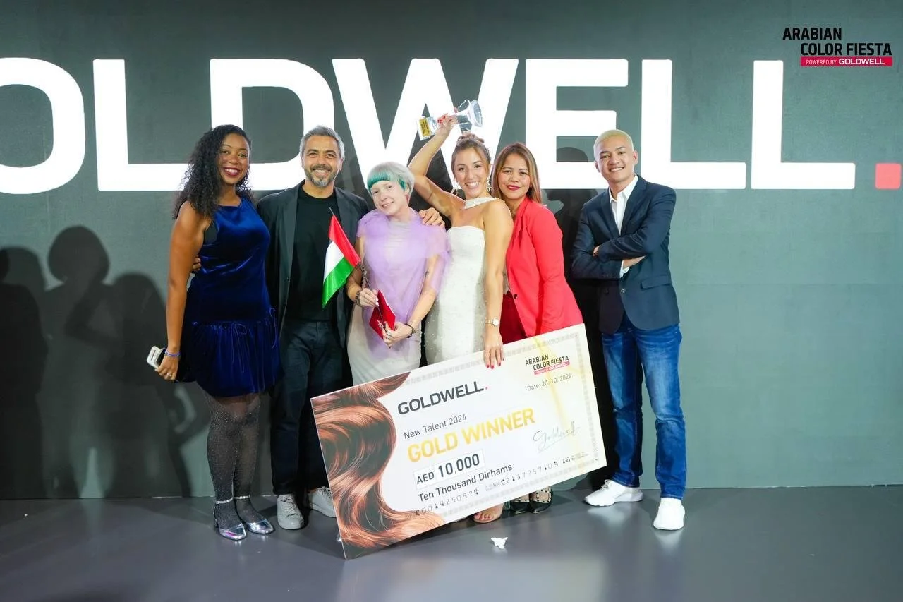 Indira Nobile, owner of Pose salon in Dubai Marina, winning goldwell award Gold first position, in the new talent category.