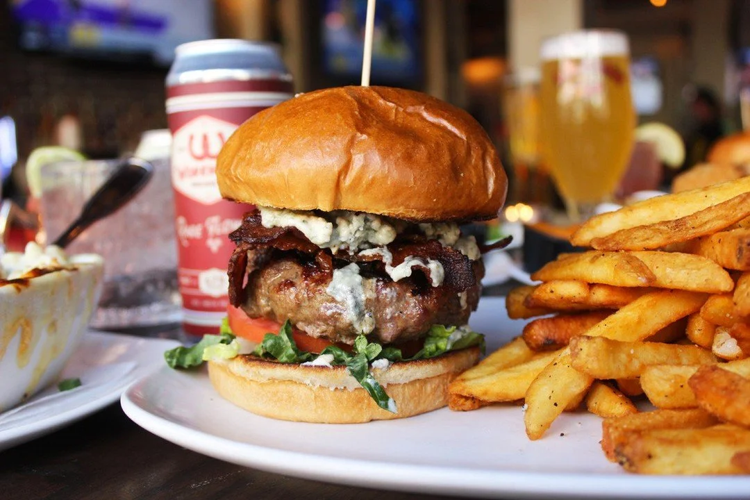 🍔🎉 It's time to hit that burger bliss! Join us for Ultra Burger Night at Founding Fathers! 🥳 Sink your teeth into our mouthwatering burgers for just $9.99, and wash it down with ice-cold $2 Michelob Ultra! 🍻 Bring your friends, your appetite, and