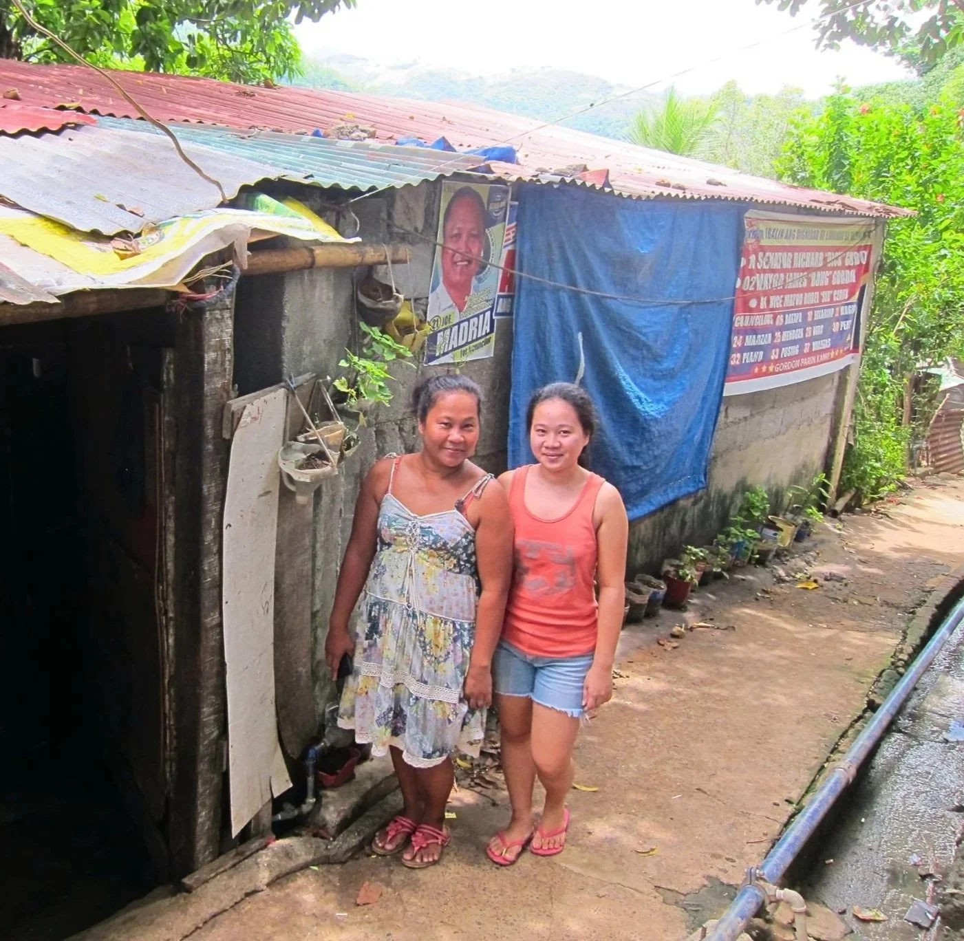 JESSICAN SMITH SCHOLARSHIP FUND STUDENT OUTSIDE HER RURAL HOME