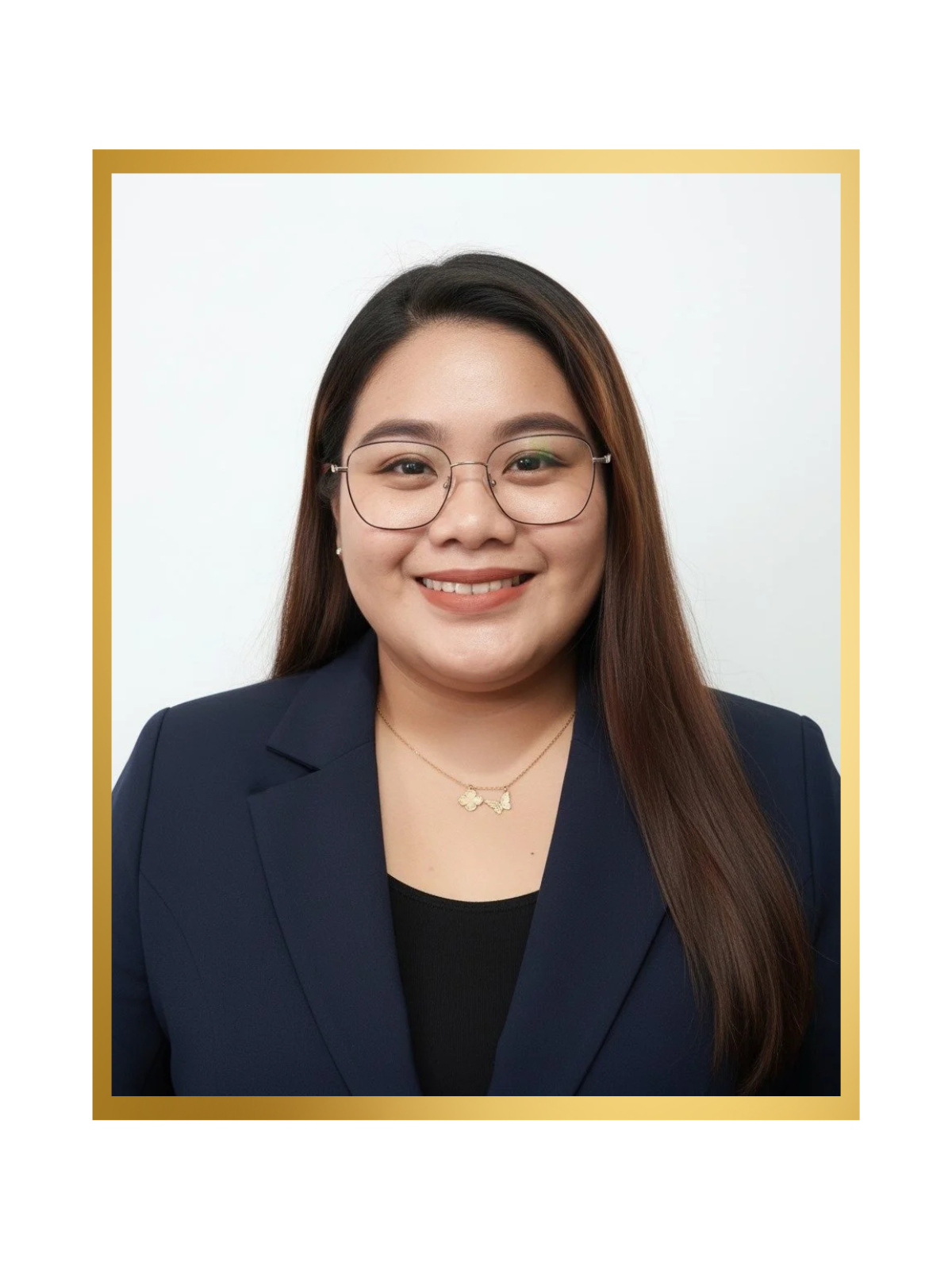 Professional portrait of a smiling woman with long straight hair, glasses, wearing a navy blazer and a gold butterfly necklace, against a white background with a gold border.