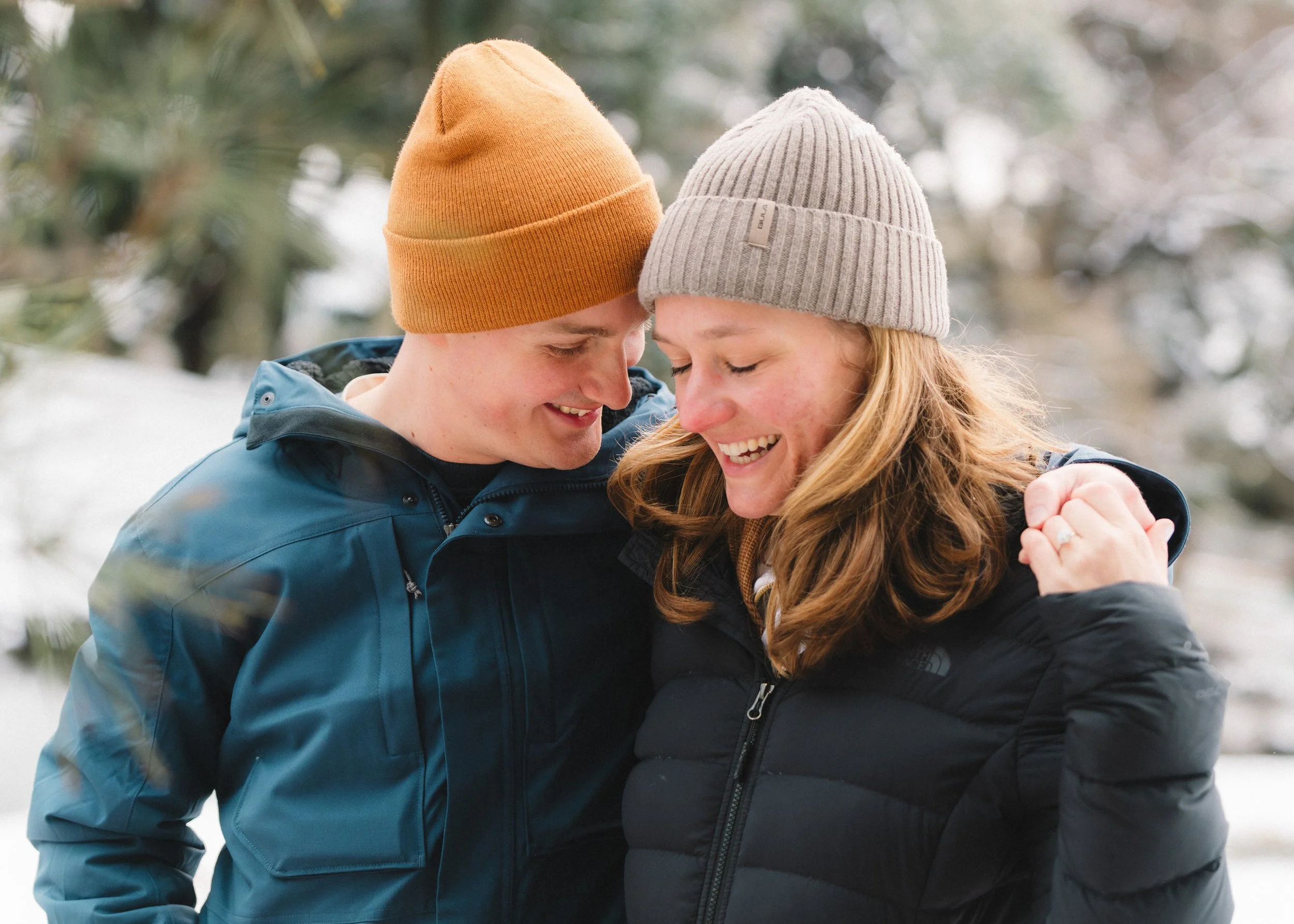 Couple celebrating engagement after surprise proposal in Japan