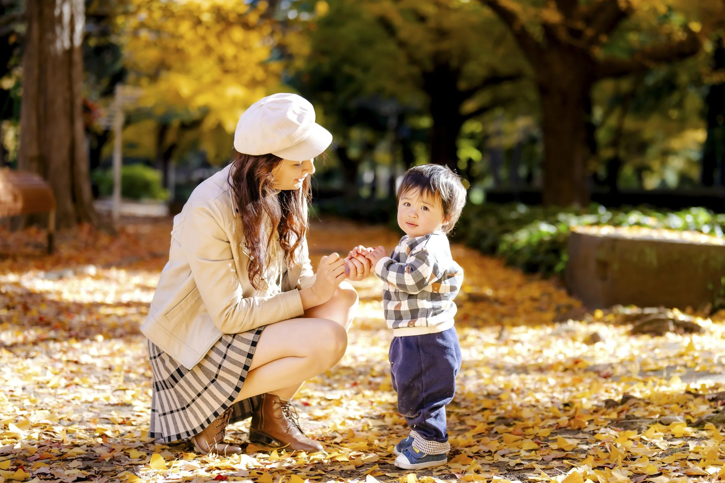 Family photoshoot in Autumn in Tokyo in coordinated outfits with a little child