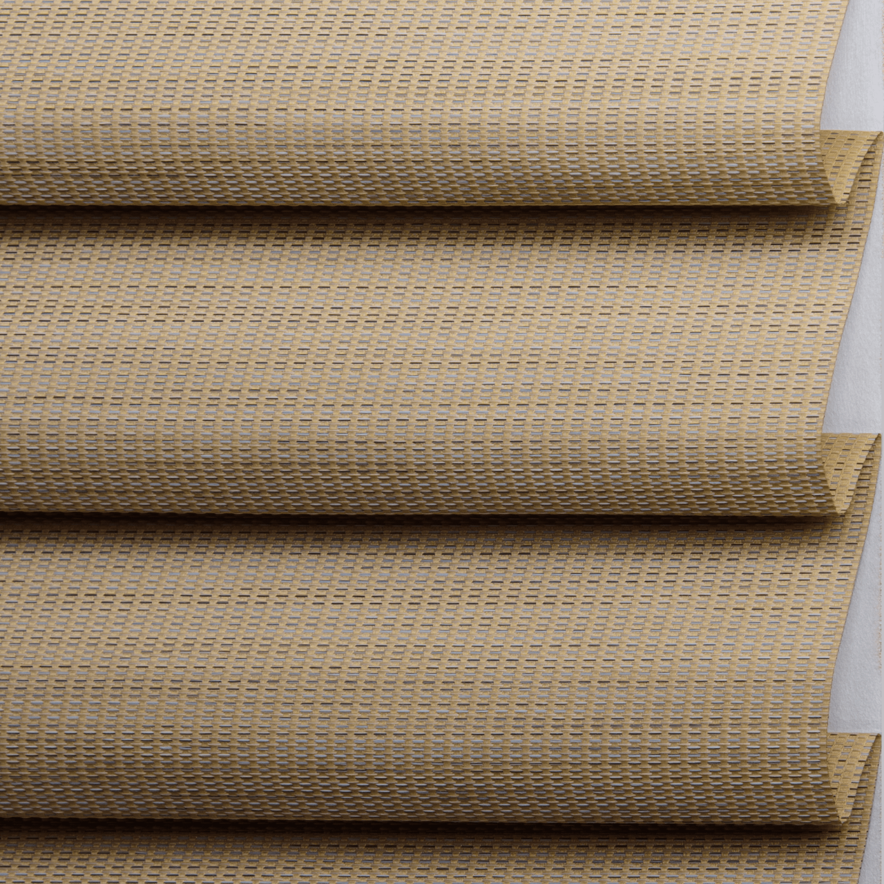 Close-up of four stacked cardboard boxes with a textured, dotted surface and a slight shadow underneath each.