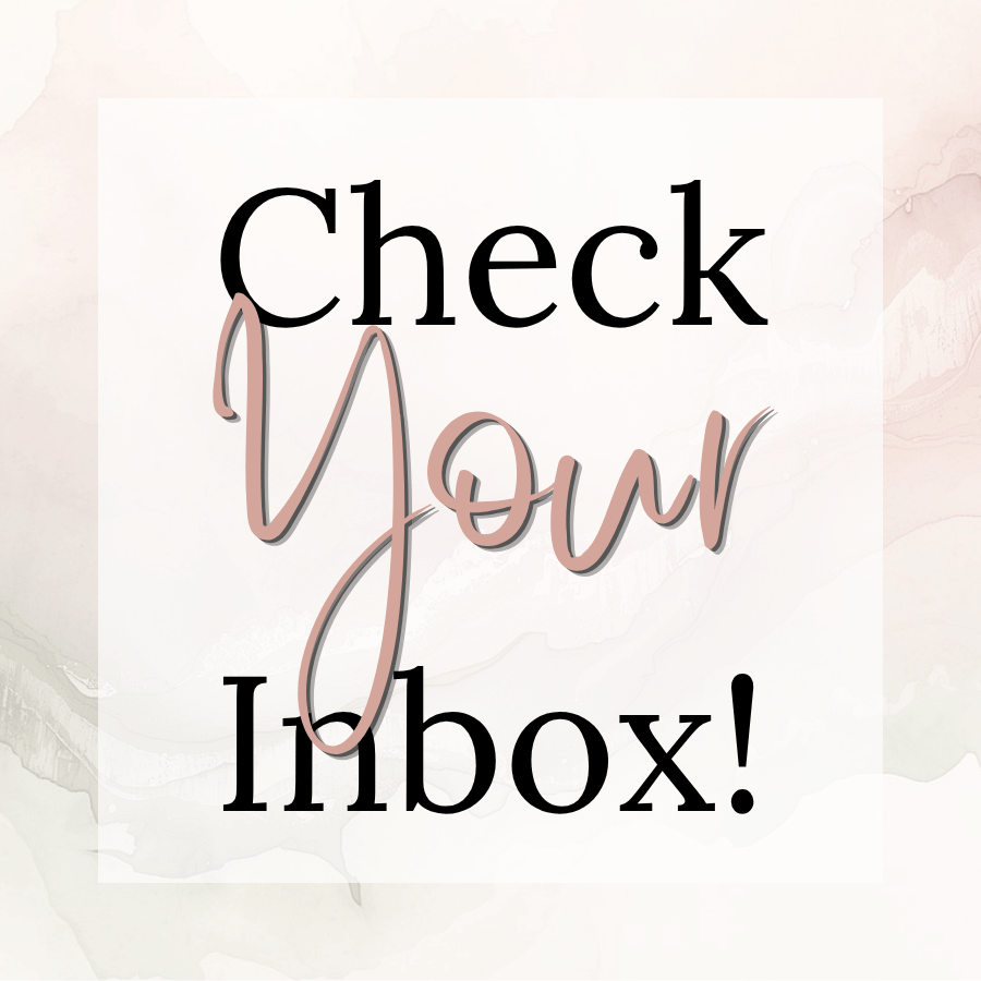 A decorative message that says, 'Check Your Inbox!' with the word 'Check' and 'Inbox!' in bold black letters and 'Your' in a stylish pink cursive font, set against a soft, abstract background.