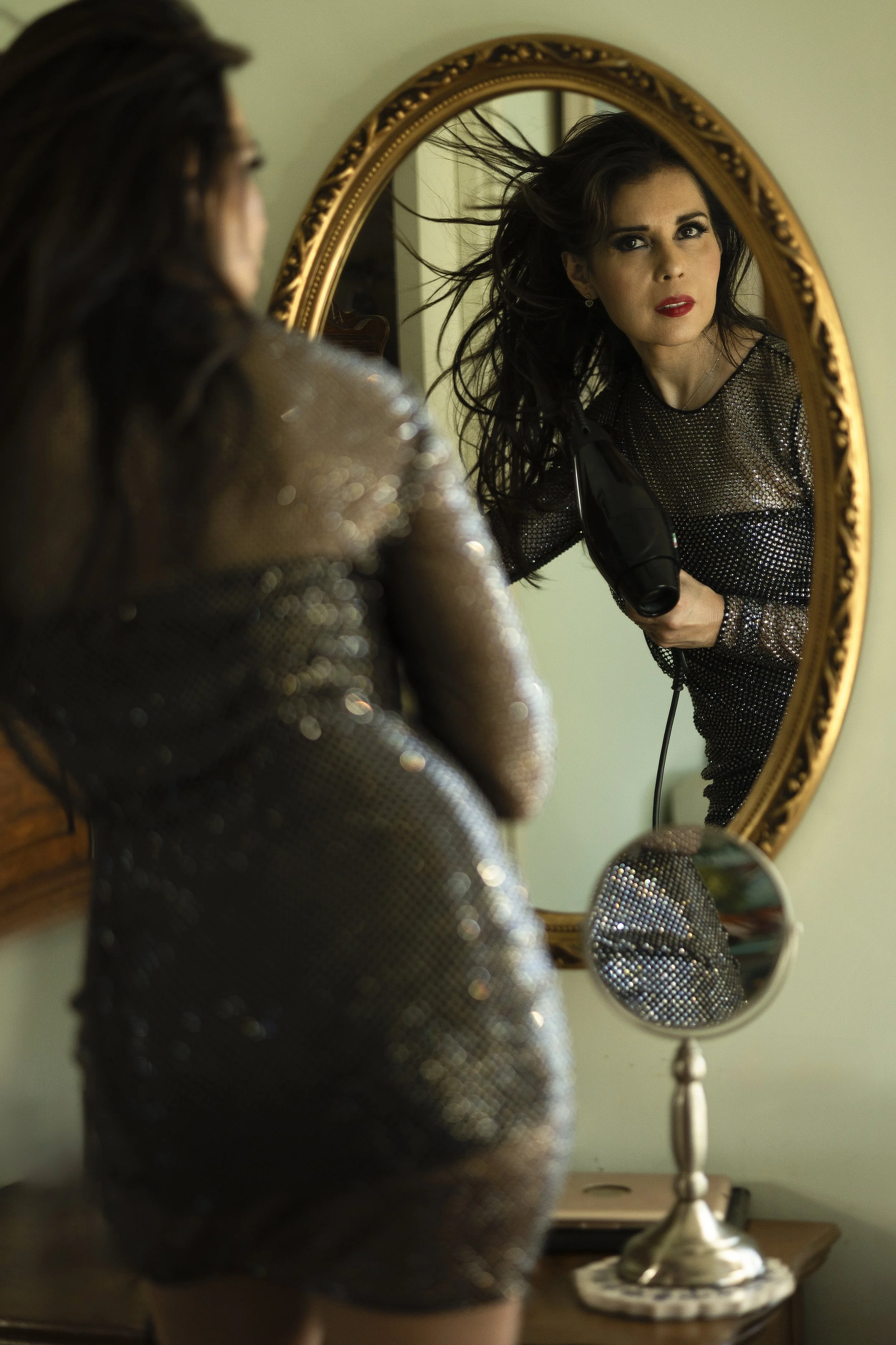 Styling hair in the mirror