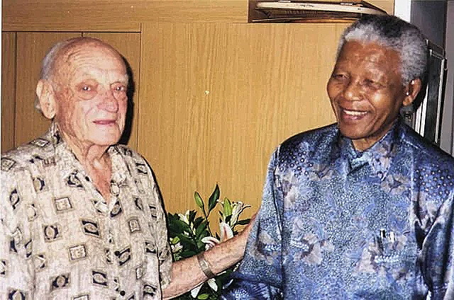 My father Harry welcomes president Mandela to his apartment - 1999
