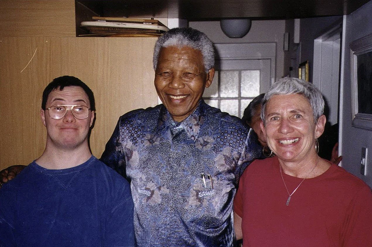 President Mandela poses with Cy and my wife Joyce Brigish
