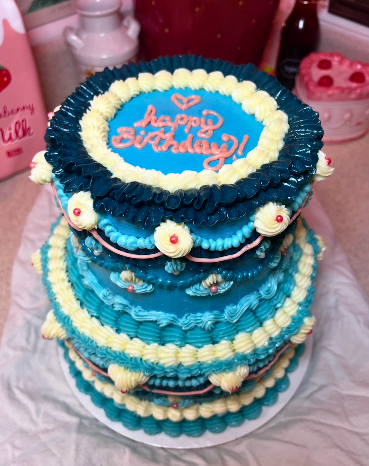 Blue Tiered Cake Top.png