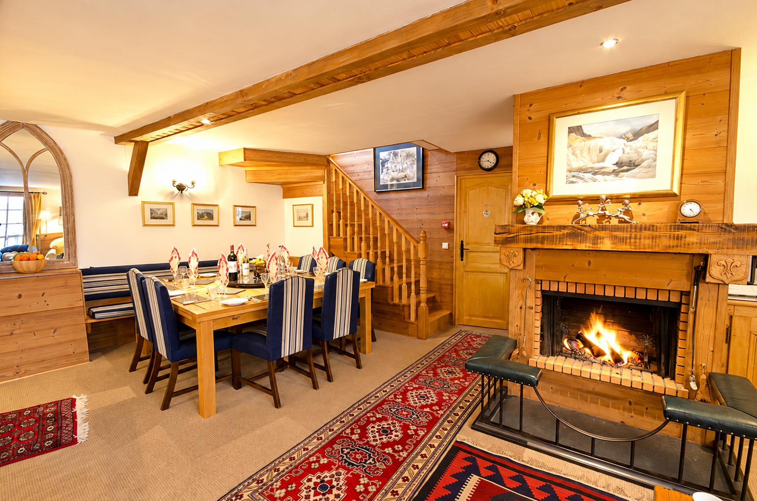 Elegant warm interior with fireplace and staircase.png