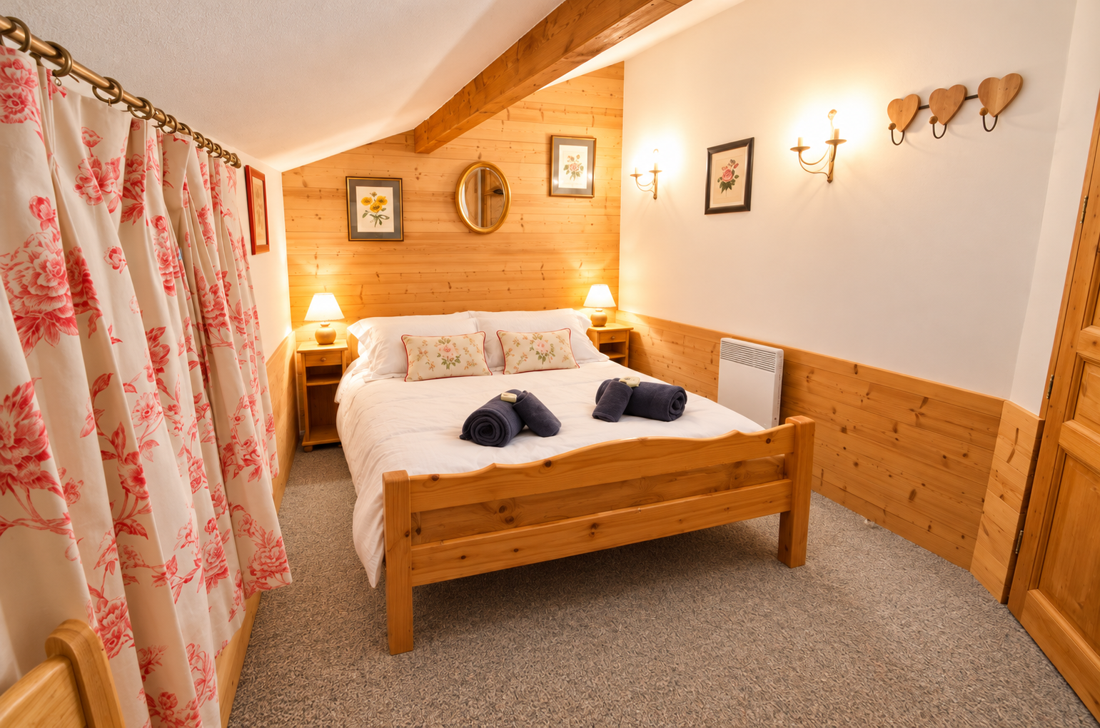 Bright chalet bedroom with fresh white bedding.png