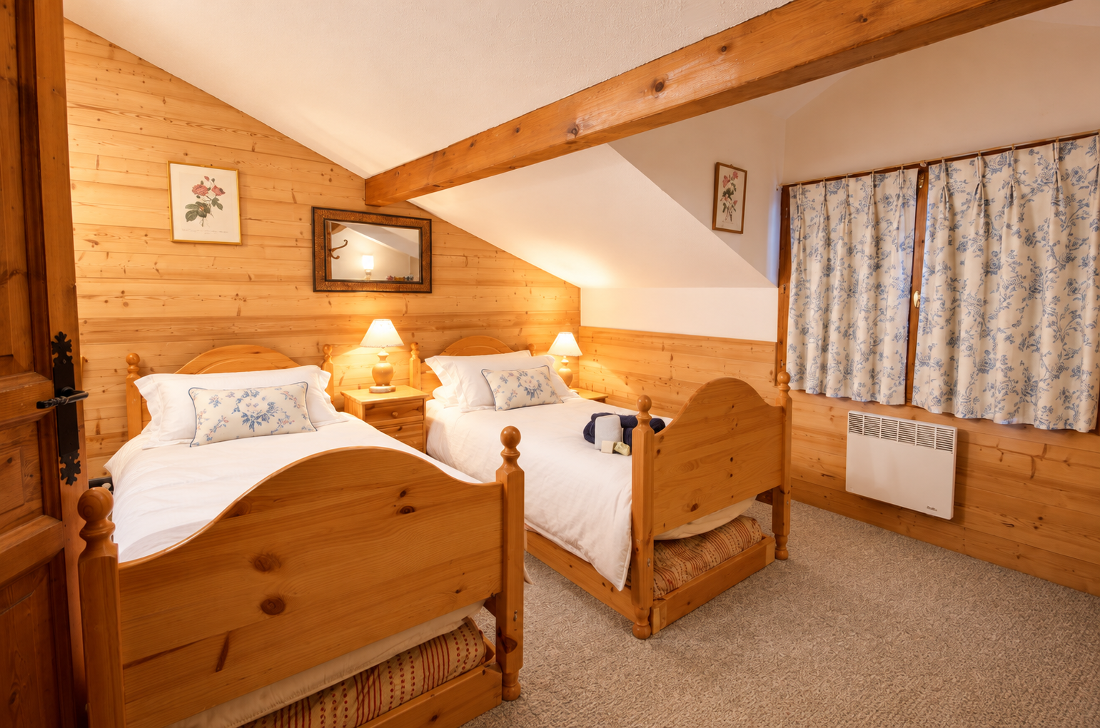 Refreshed twin beds in a chalet.png