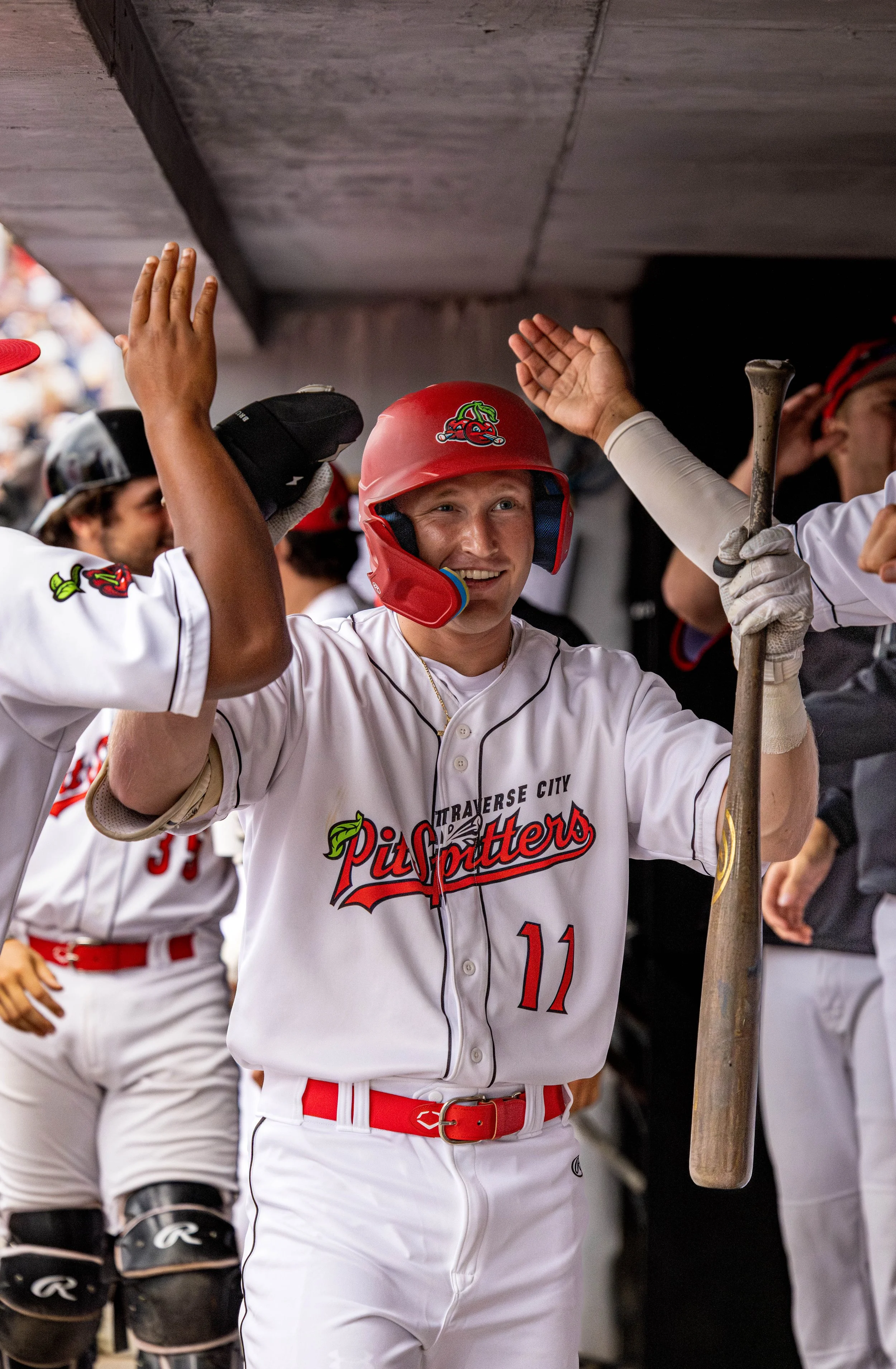 carlson zach dugout celly 2.jpg