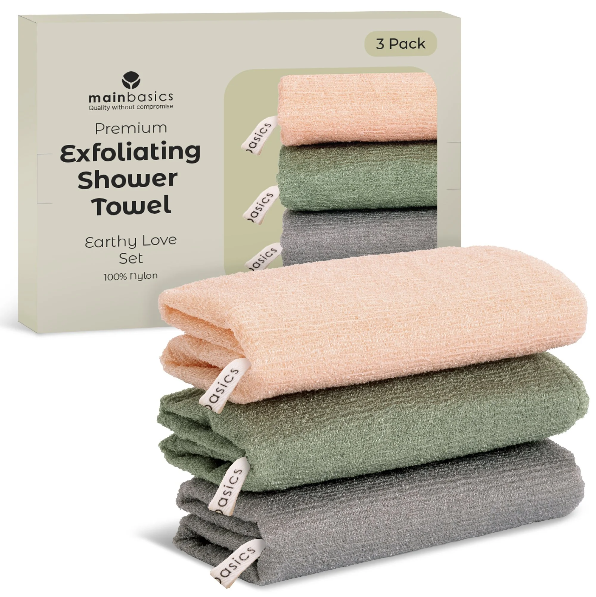 Stacked folded exfoliating shower towels in pink, green, gray, and black, with labels reading 'basics,' on pastel green packaging labeled '3 Pack, Main Basics.'