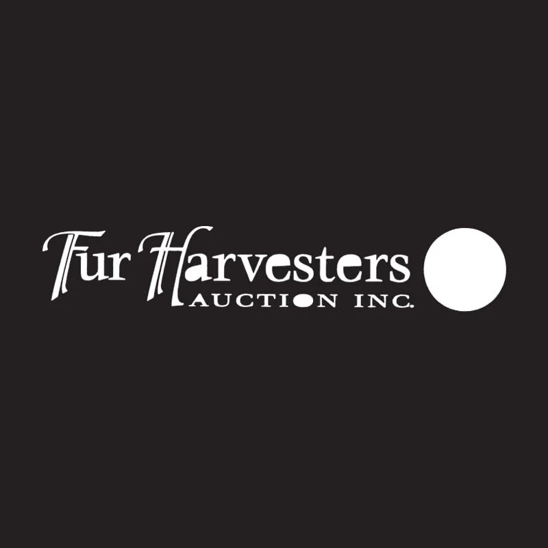 Logo of Turf Harvesters Auction Inc. with black background and white text, featuring a white circle on the right side.