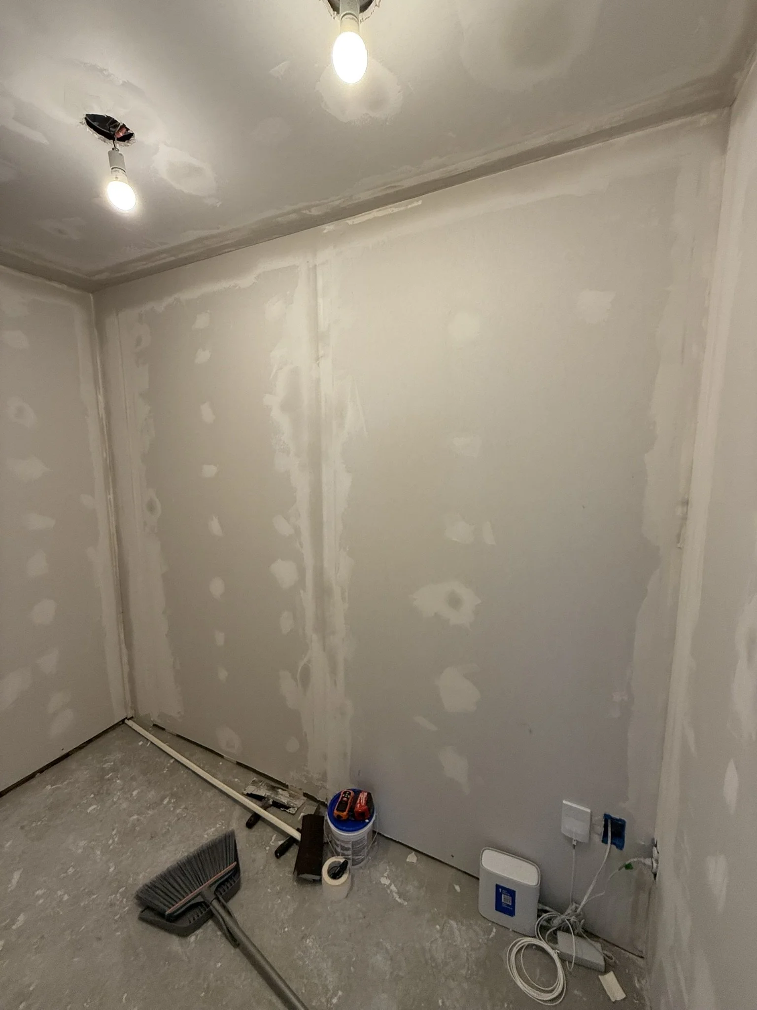 Avanelle Homes converted this unused back bathroom into a functional storage space at a home in San Antonio, TX.