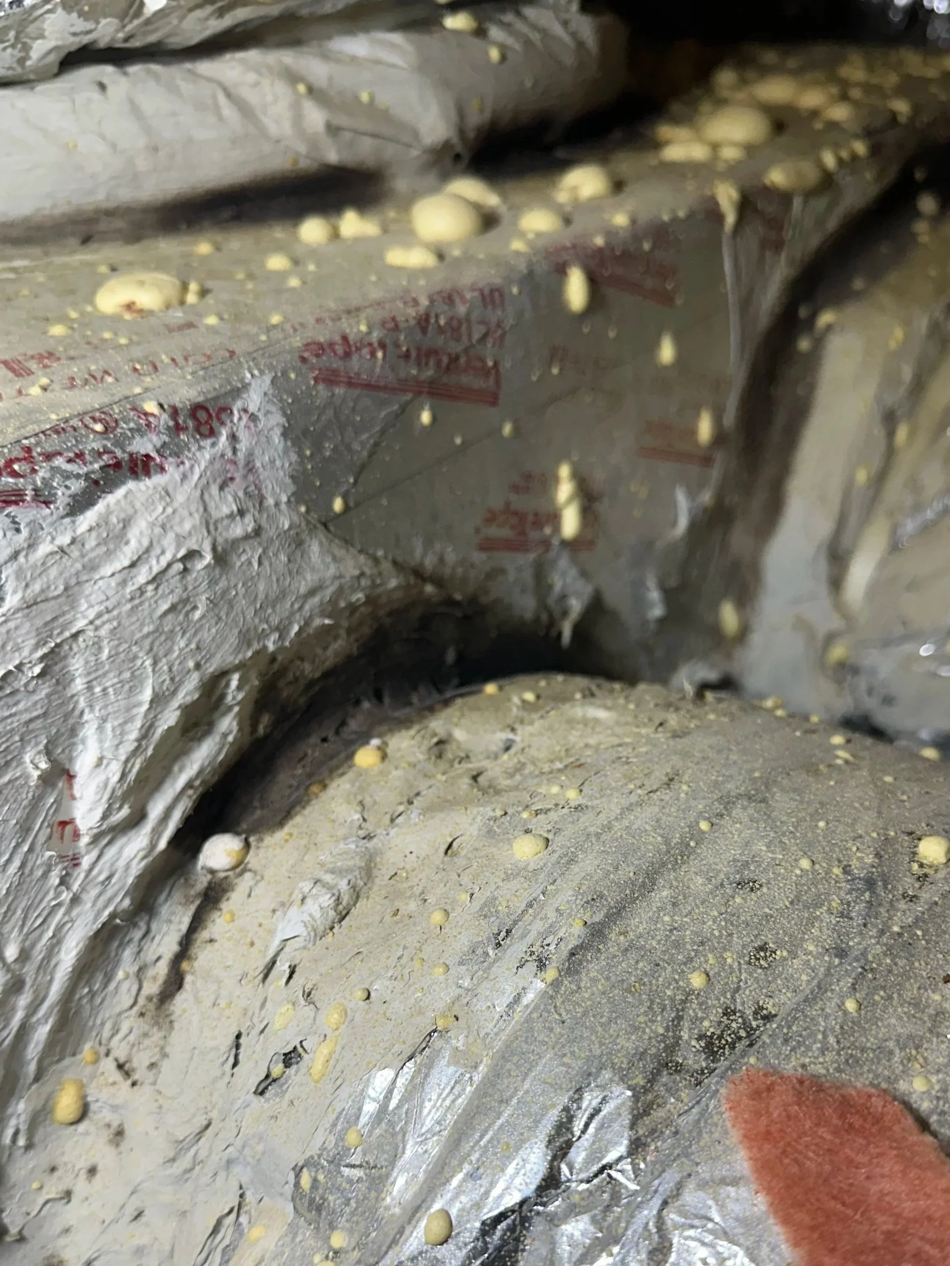 Close up photo of HVAC ductwork that Avanelle Cooling & Heating replaced which had been installed incorrectly. The condensation created an environment where problems like mold and bacteria thrive.