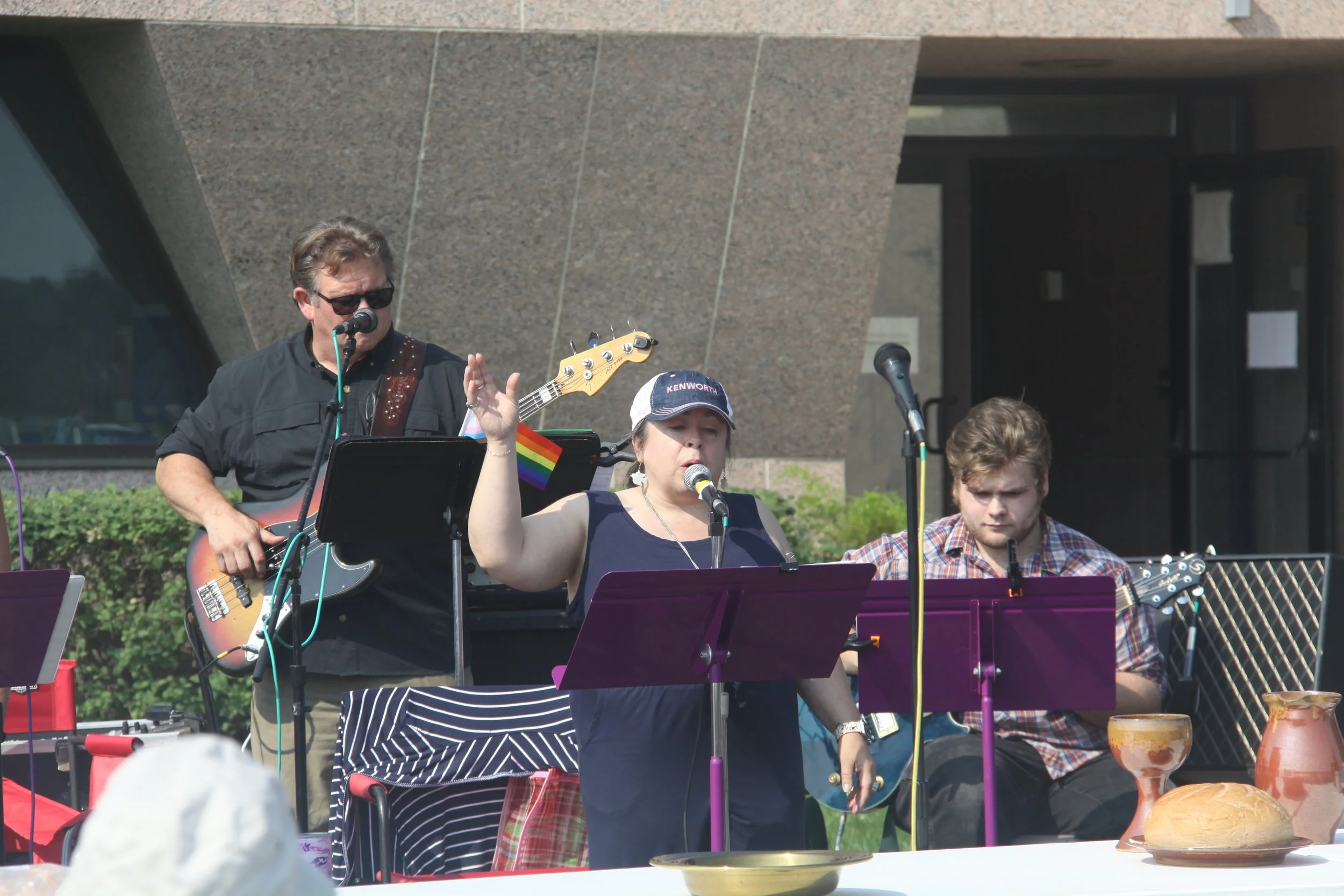Tapestry performing in the parking lot of First United Methodist Church.
