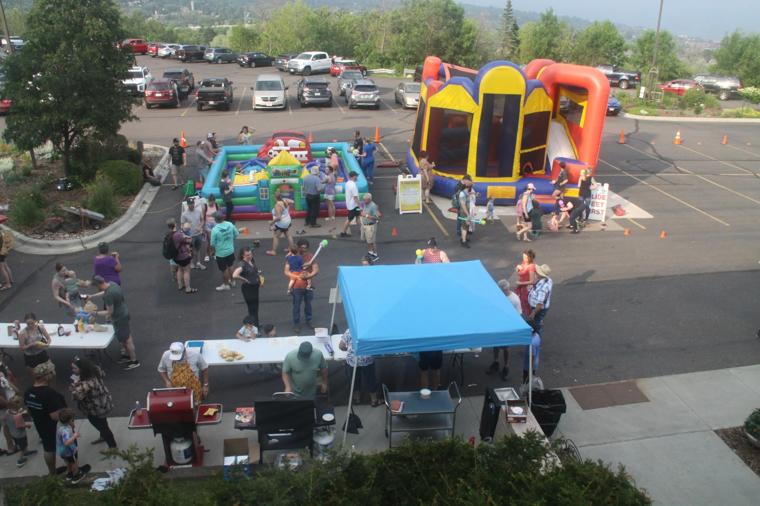 Summer Carnival - Bounce houses in the parking lot