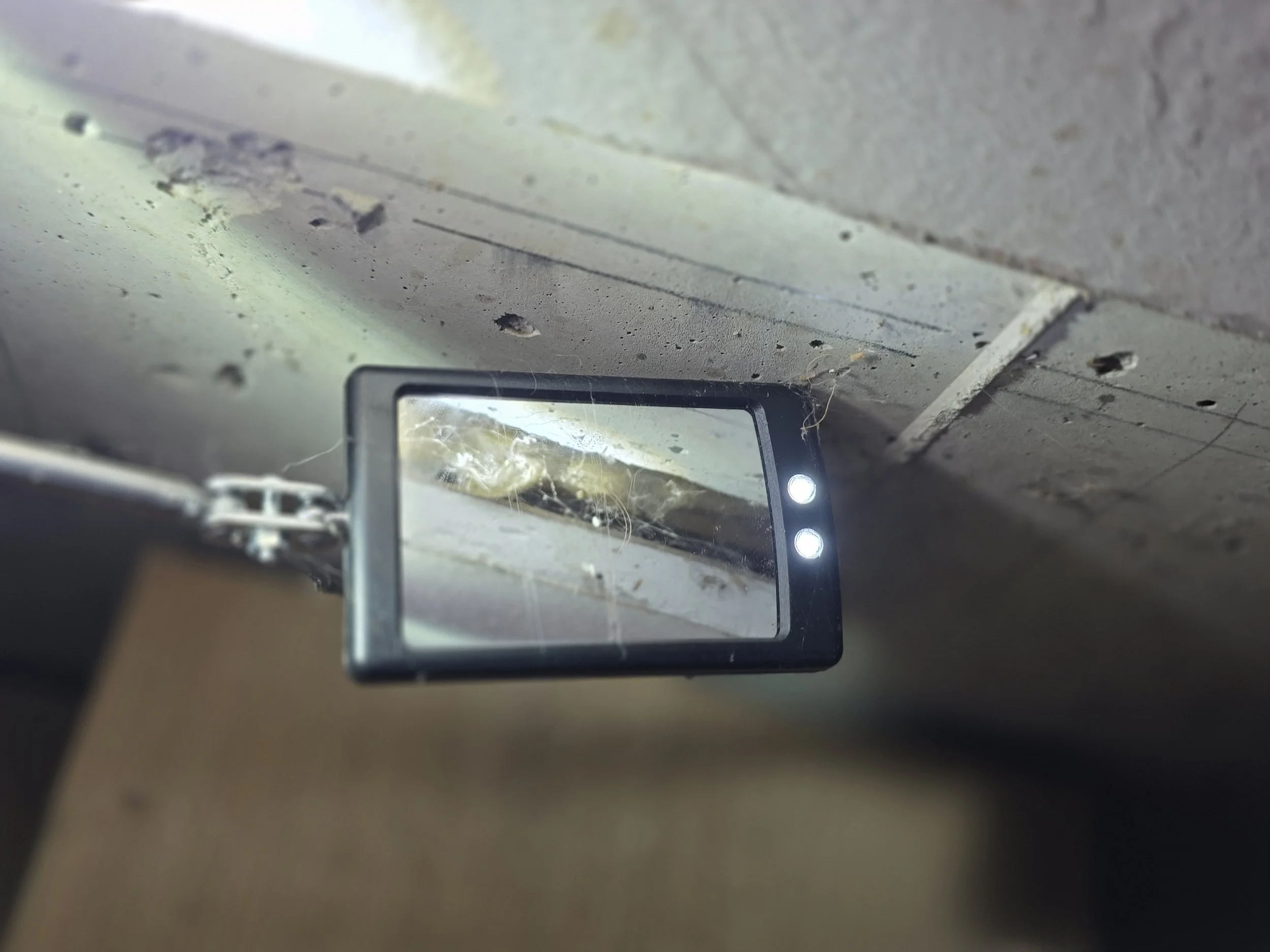 small mouse hole where drywall and stem wall meet