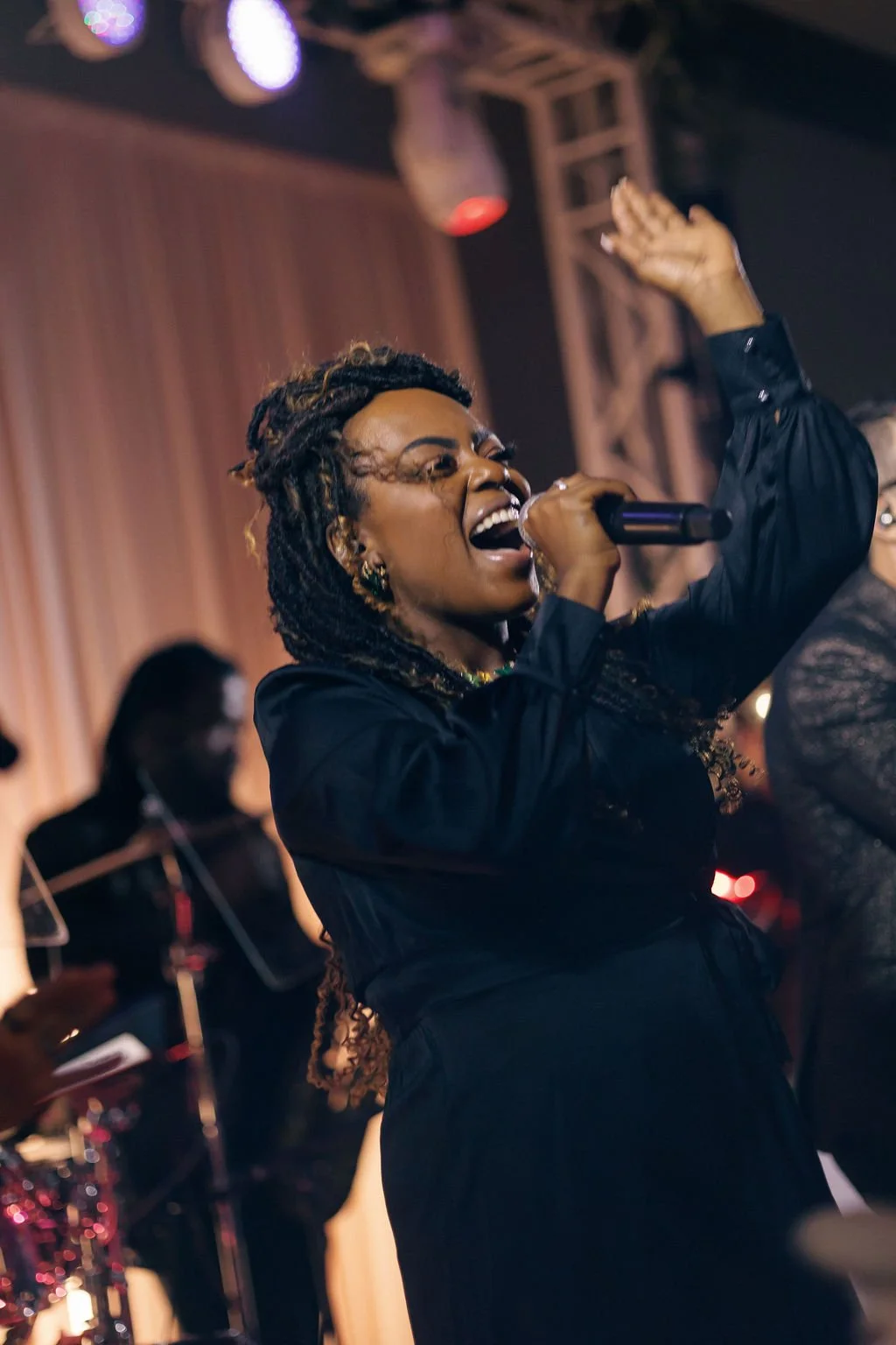 Ka' Vonda singing and leading the band at Hotel Zaza Memorial City