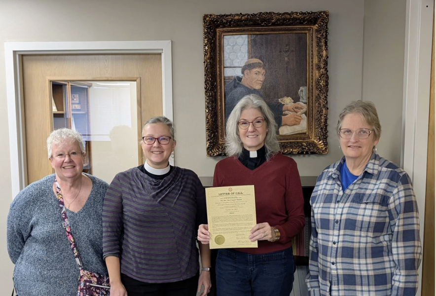 Rev. Terri Church Signs Call Paper