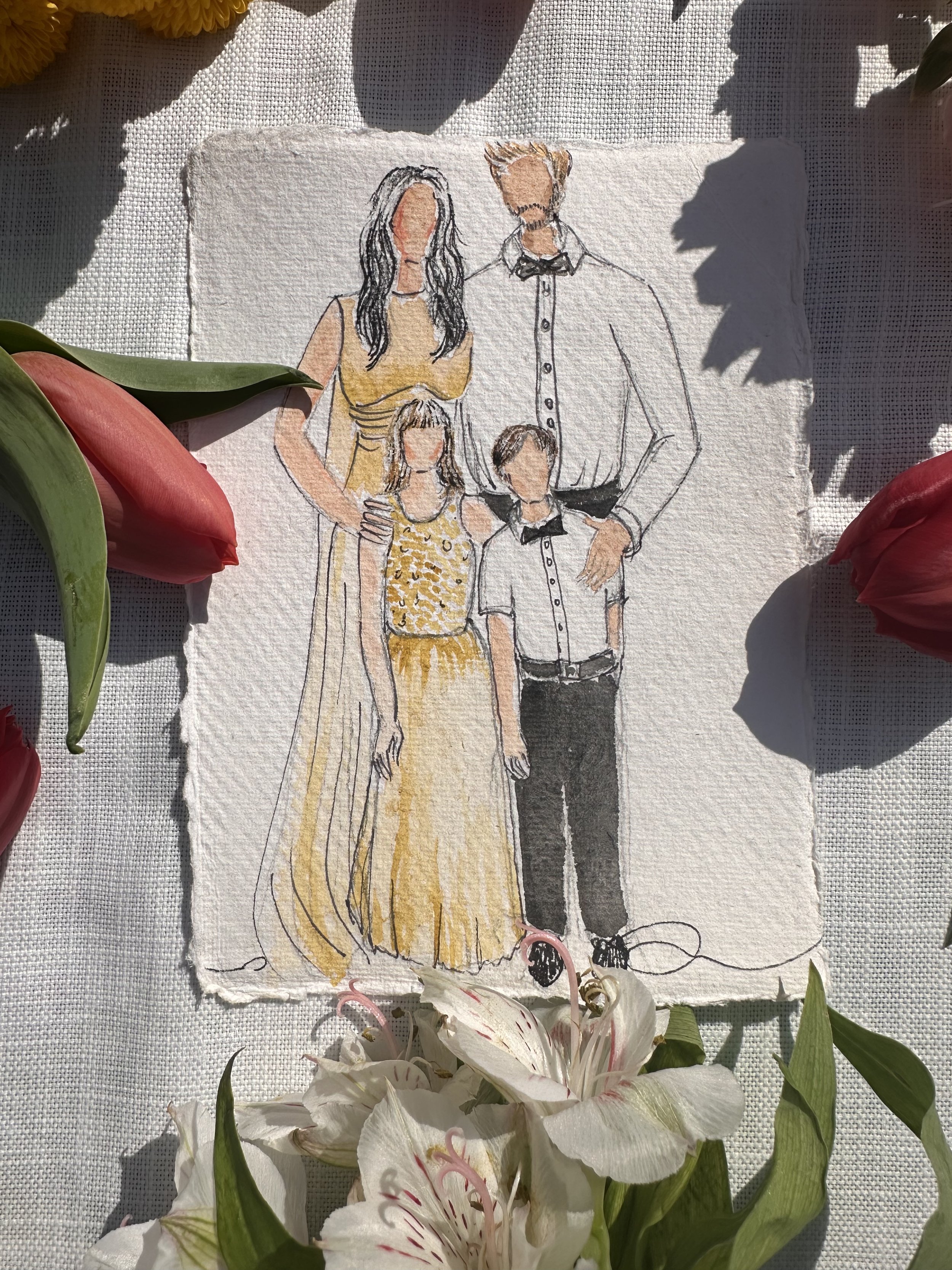 A watercolor illustration of a family of four, with two adults and two children, dressed in formal attire, surrounded by pink and white lilies and flowers.