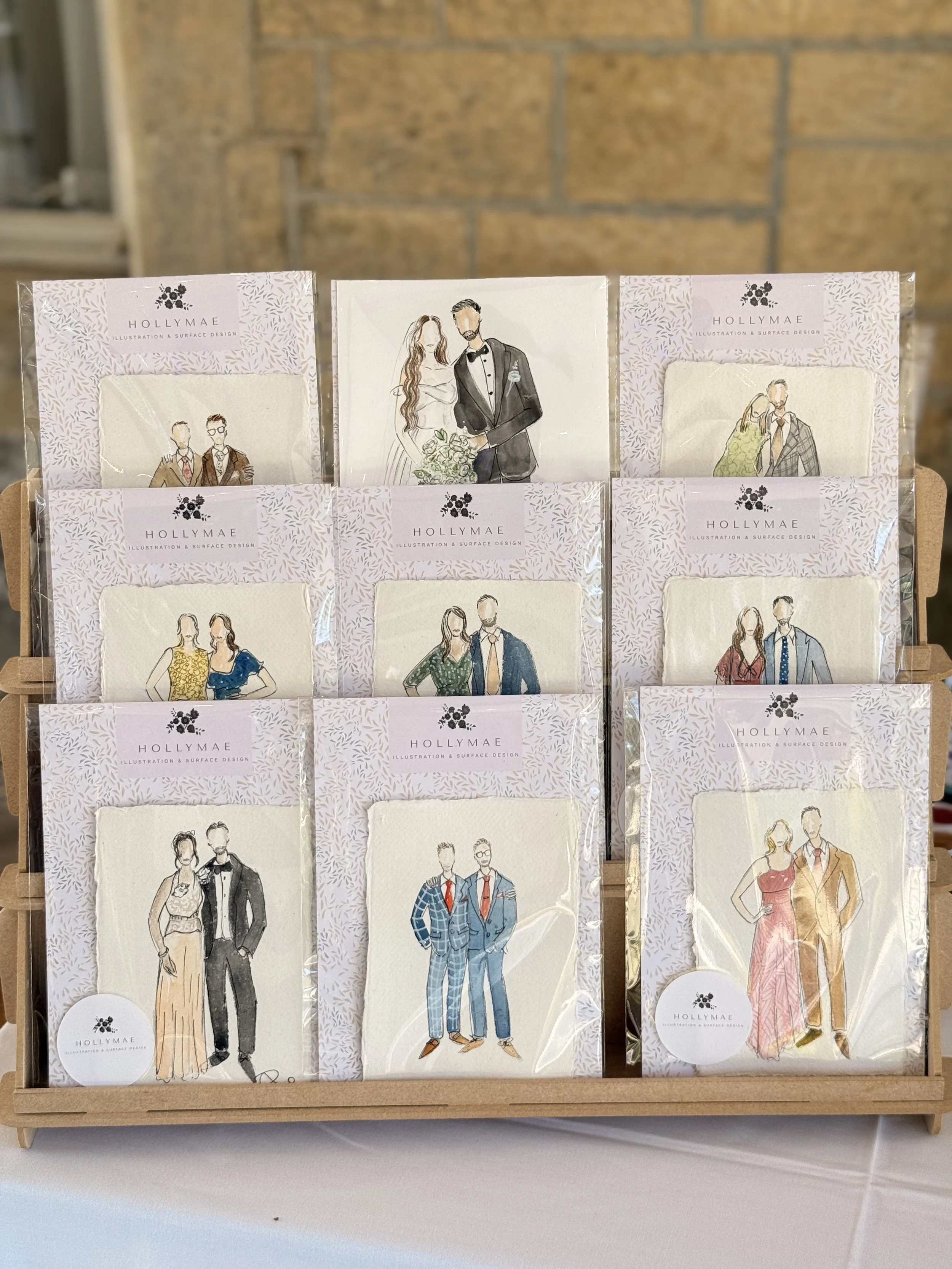 Live event illustrations of guests, including bright Asian wedding outfits, family portraits and green bridesmaids.