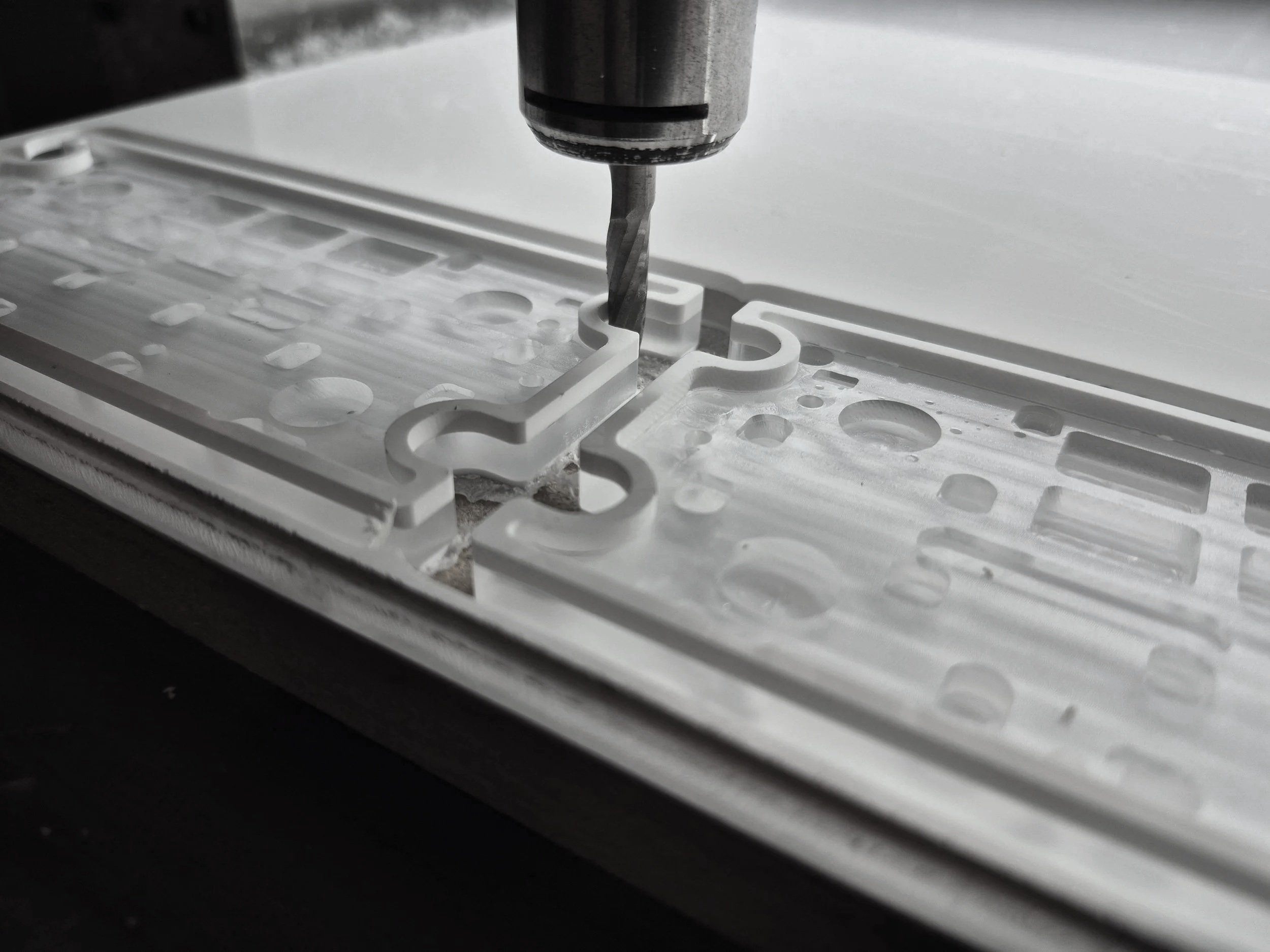 CNC machine cutting two 9mm acrylic control panels for an aerospace client at Tempest Industries in Sarnia, Ontario.