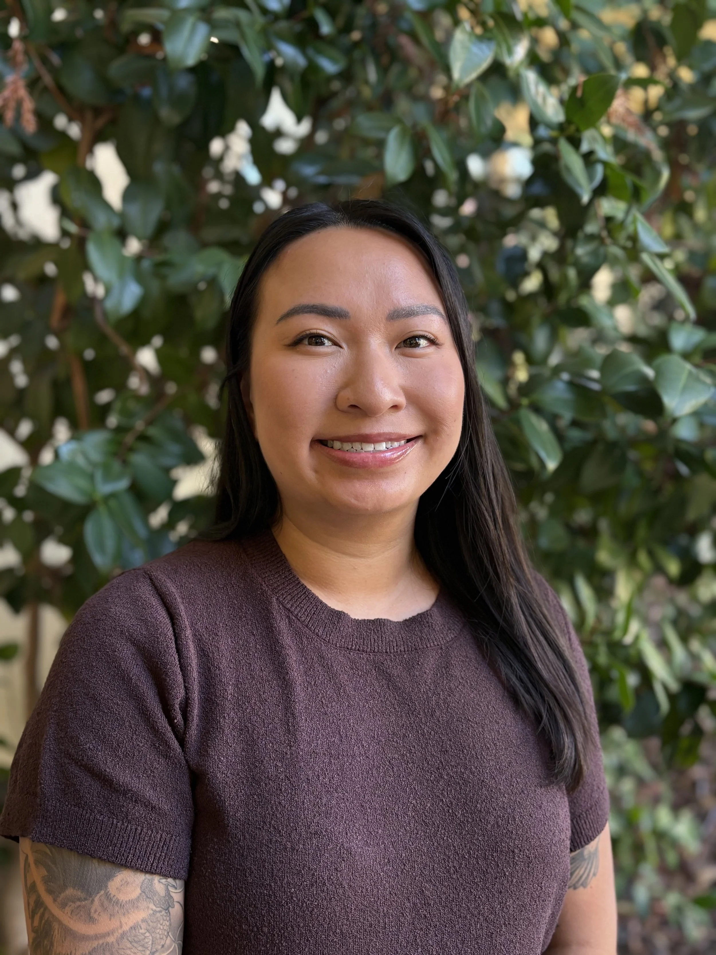 an image of Yvonne Nguyen smiling at the camera
