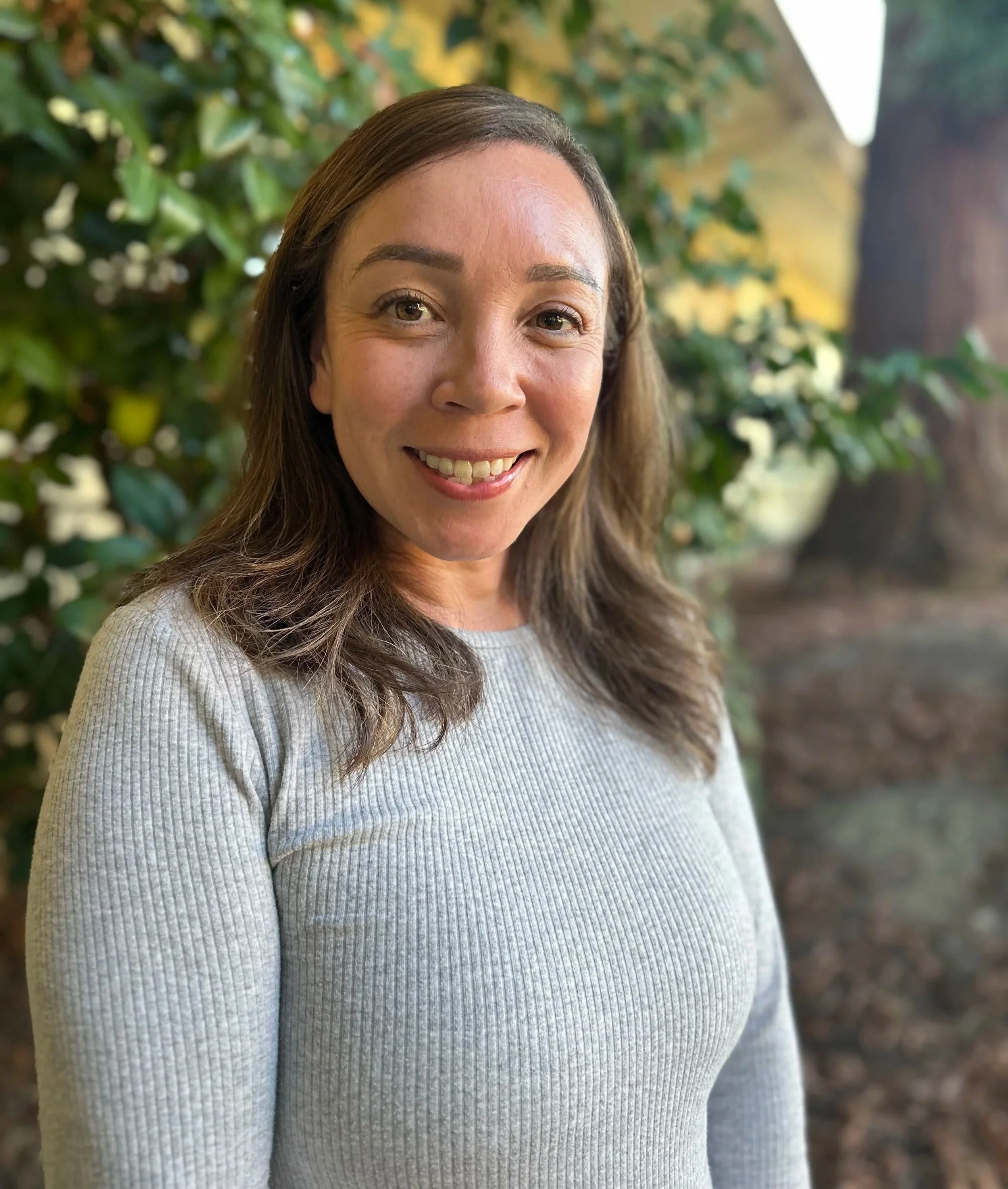 an image of Laura McCormick smiling at the camera