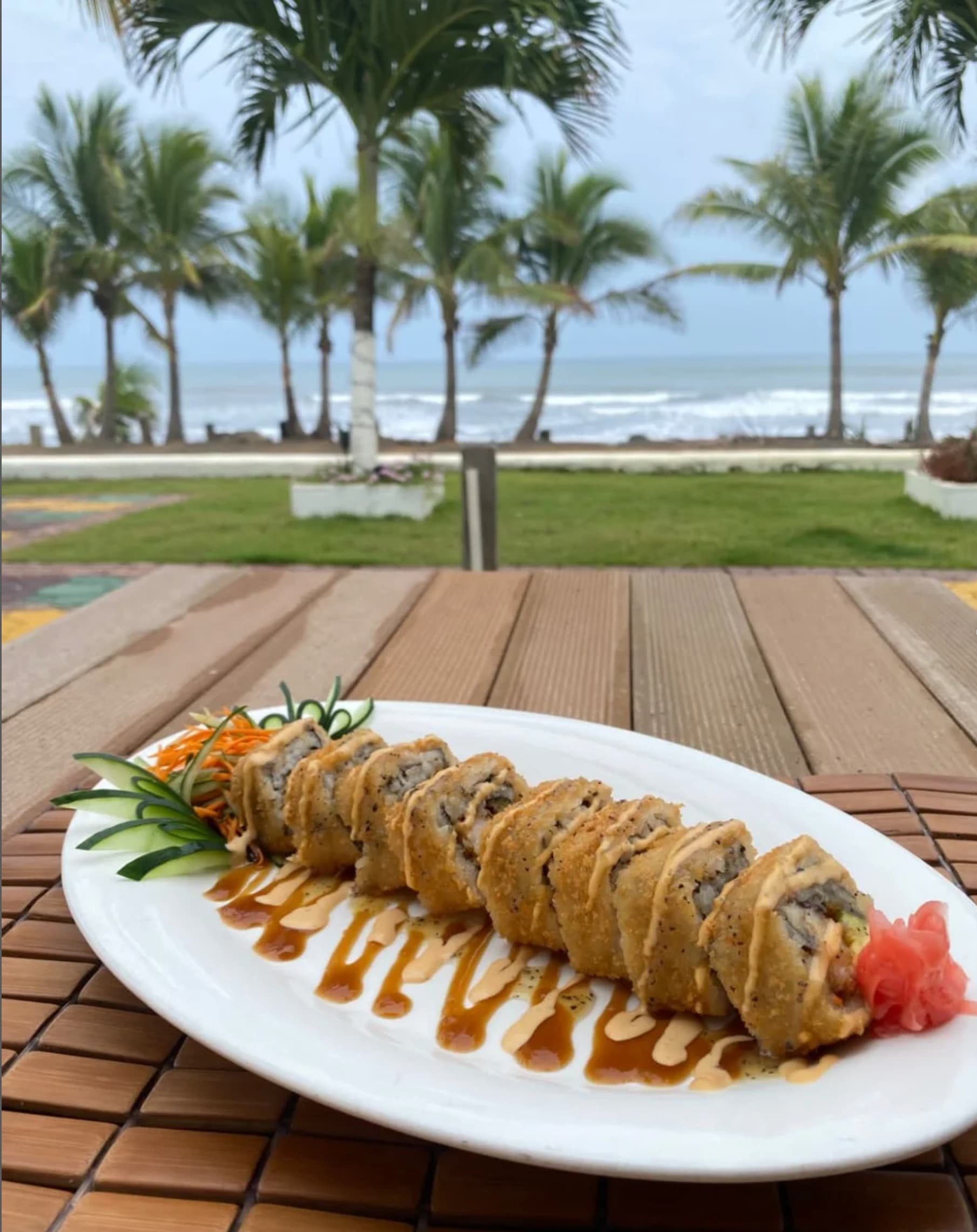 fresh sushi roll with delicately cut vegetables and bright ginger with a spicy sauce