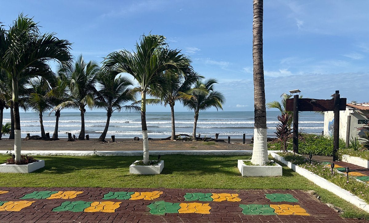 view of the ocean from the patio at Guanico Beach Resort