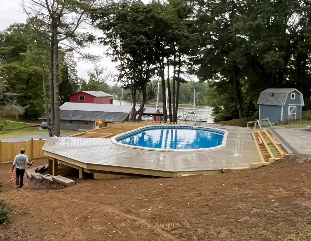Pool Installation Complete w/New Decking in Progress