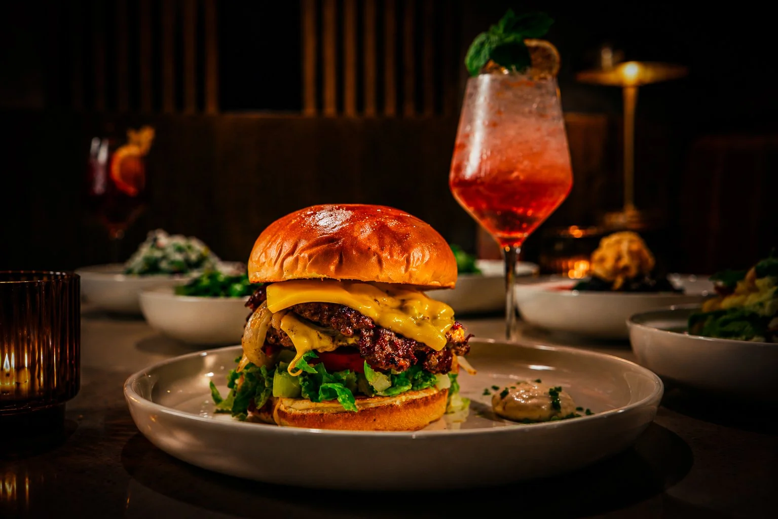 Brunch, elevated 🍔 Two hand-smashed patties, melted cheese, fresh lettuce, tomato, pickles and signature Bosc sauce all nestled in a warm brioche bun. The weekend is the perfect time to indulge.