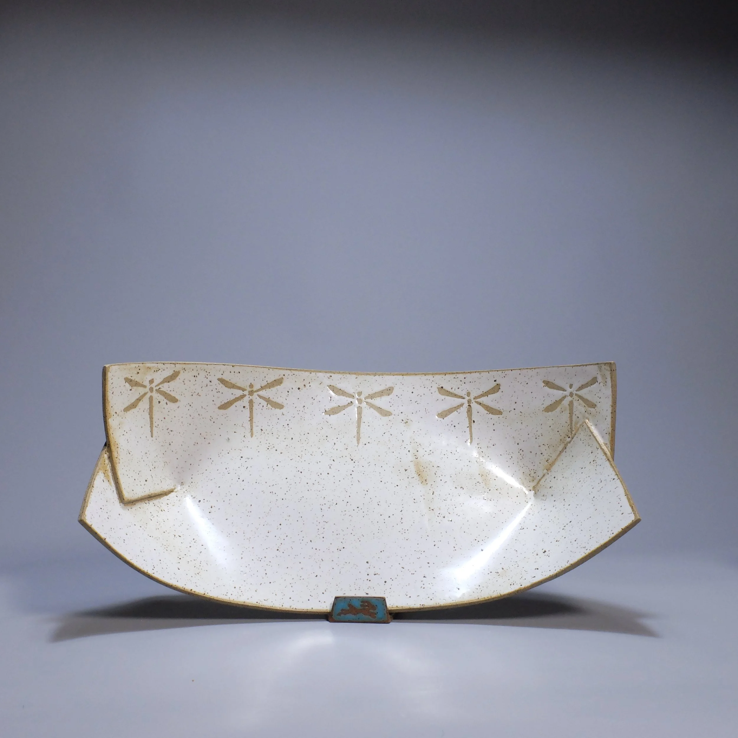 Big Boat, 2026. Speckled stoneware, white glaze, dragonfly motif. 16.5"L, 8.5"W, 5.25"D.